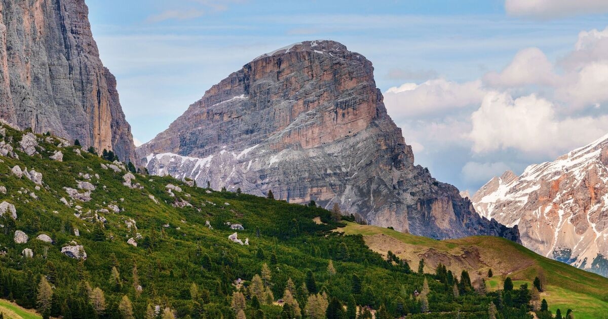 Magical European destination filled with luxury hotels in the shadow of mountains